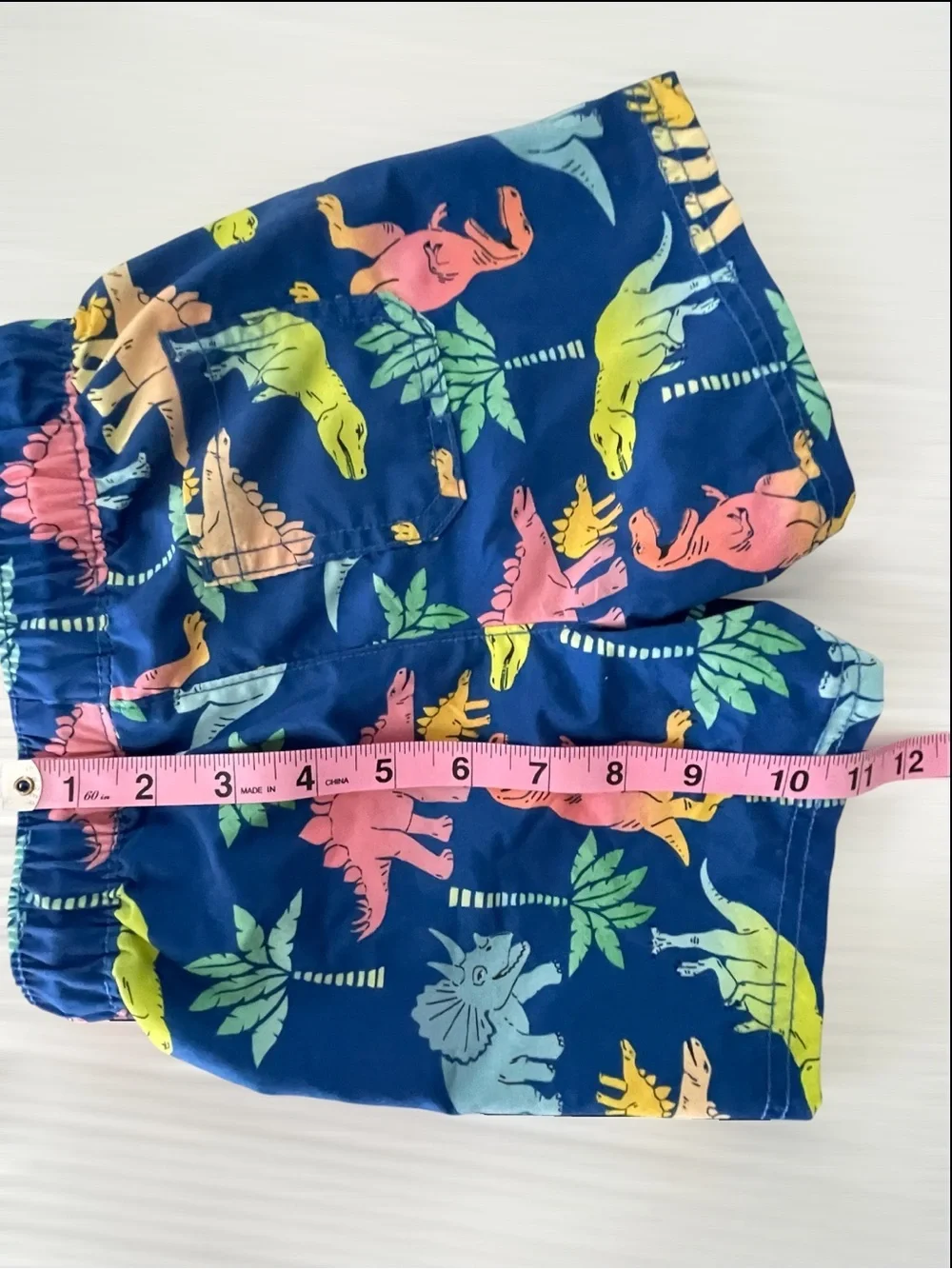 Old Navy Blue Kids Swim Shorts with Multicolor Dino Print